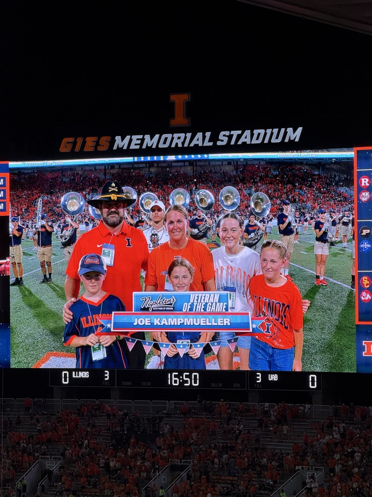 Kampmueller family on the jumbo scoreboard at the U of I football game.