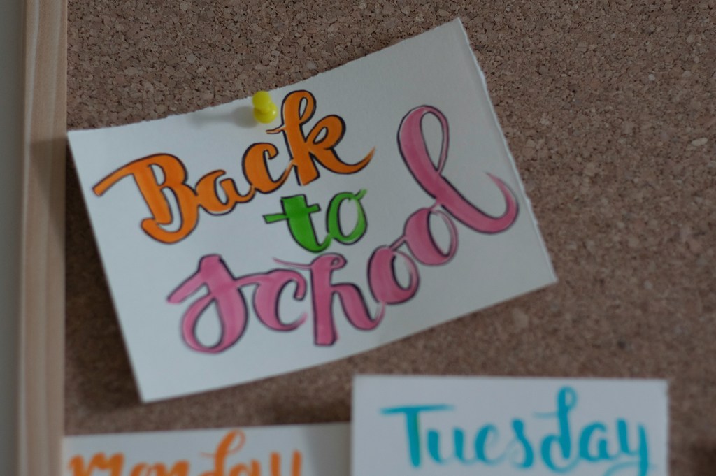 Back to school note pinned to bulletin board.