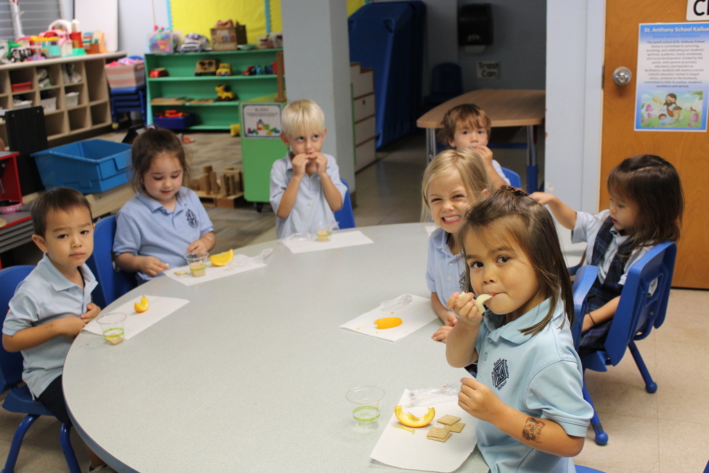 Children in aftercare eating their snacks.