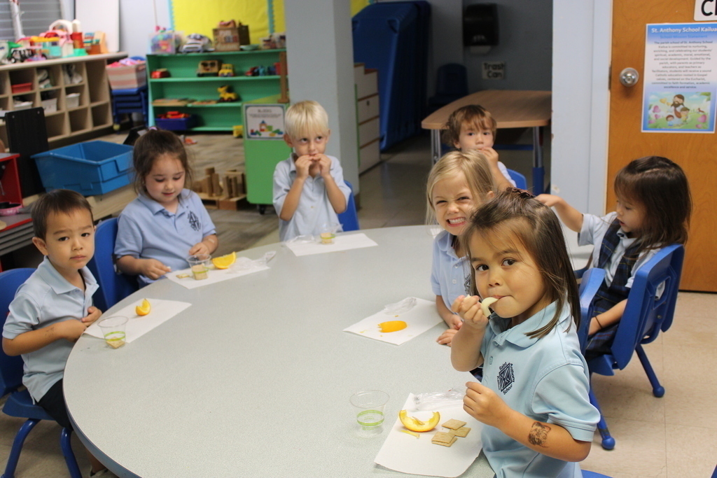 ELC students eating snack.