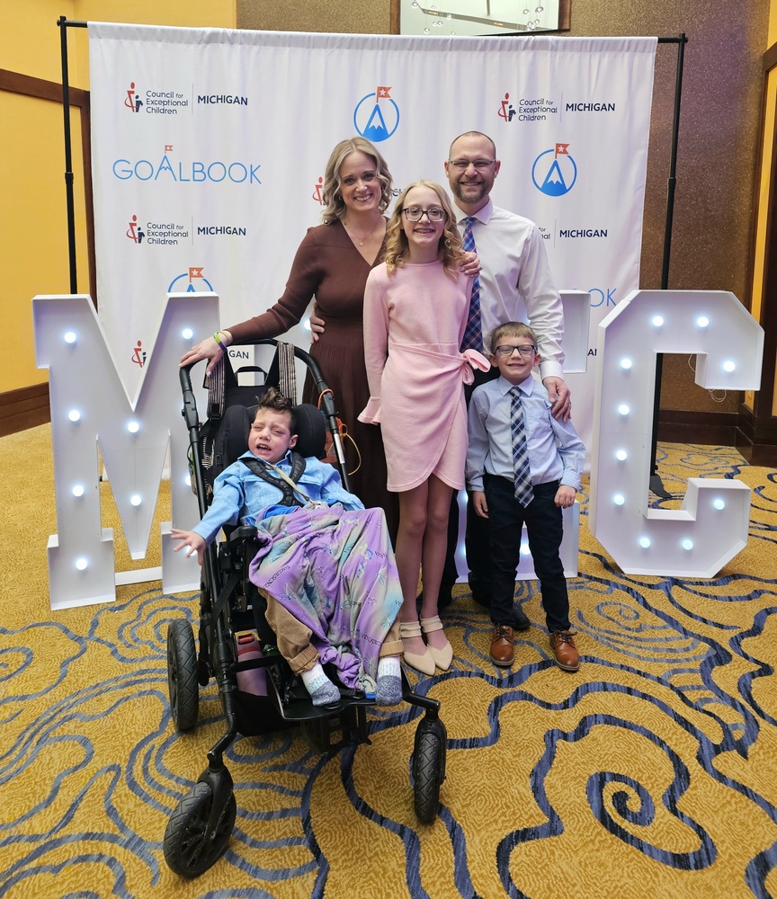 Dan and Lindsay Krauskopf, recipients of the 2026 Exceptional Parent Award from the Michigan Council for Exceptional Children, are pictured with their children at the organization’s annual conference in Grand Rapids on Feb. 26. From left are Miles Krauskopf, Lindsay Krauskopf, Juliet Krauskopf, Dan Krauskopf, and Elijah Krauskopf.