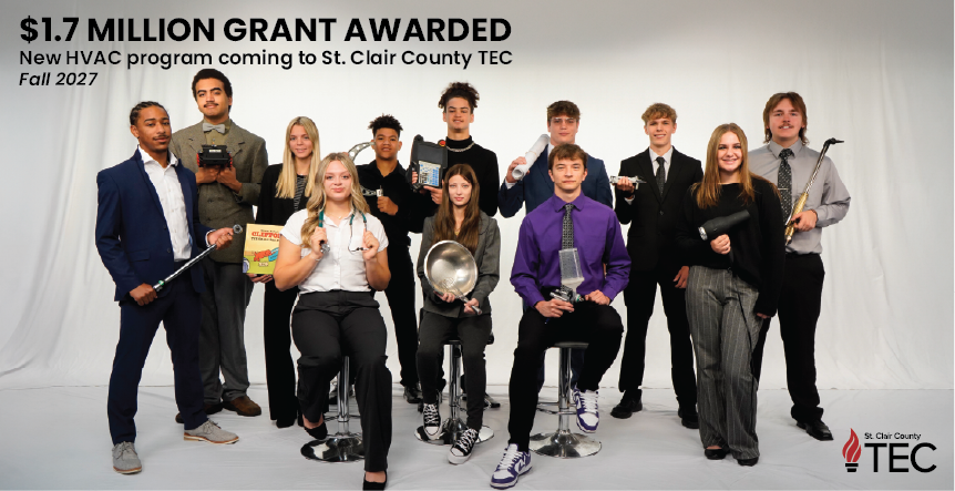TEC students pose with props from their individual programs