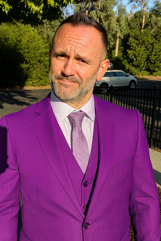 Joe Zima wearing a bright purple suit