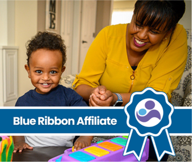 A smiling mom and baby with the Parents As Teachers Blue Ribbon logo and text that reads, "Blue Ribbon Affiliate."