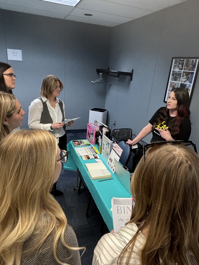 Photos of cosmetology students participating in a job fair.