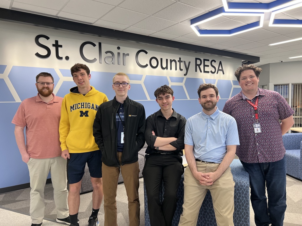 TEC students and SCCRESA staff members pose together in the Administration Building lobby during a job shadow experience