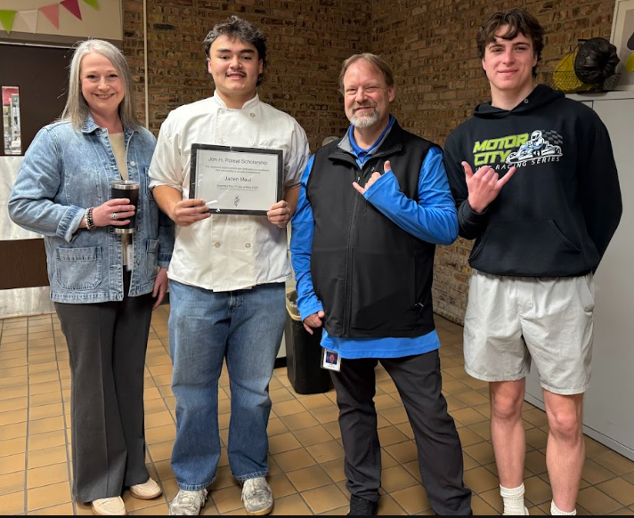TEC student Jayden Maul stands with TEC counselors Emily Bronzie and Lane Robinson and NTHS AM president Caleb VanSingel