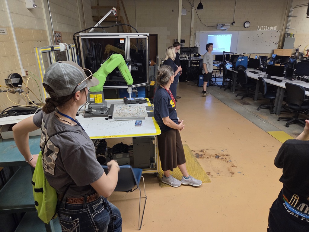 Students listen to a presentation in SC4's advanced manufacturing classroom