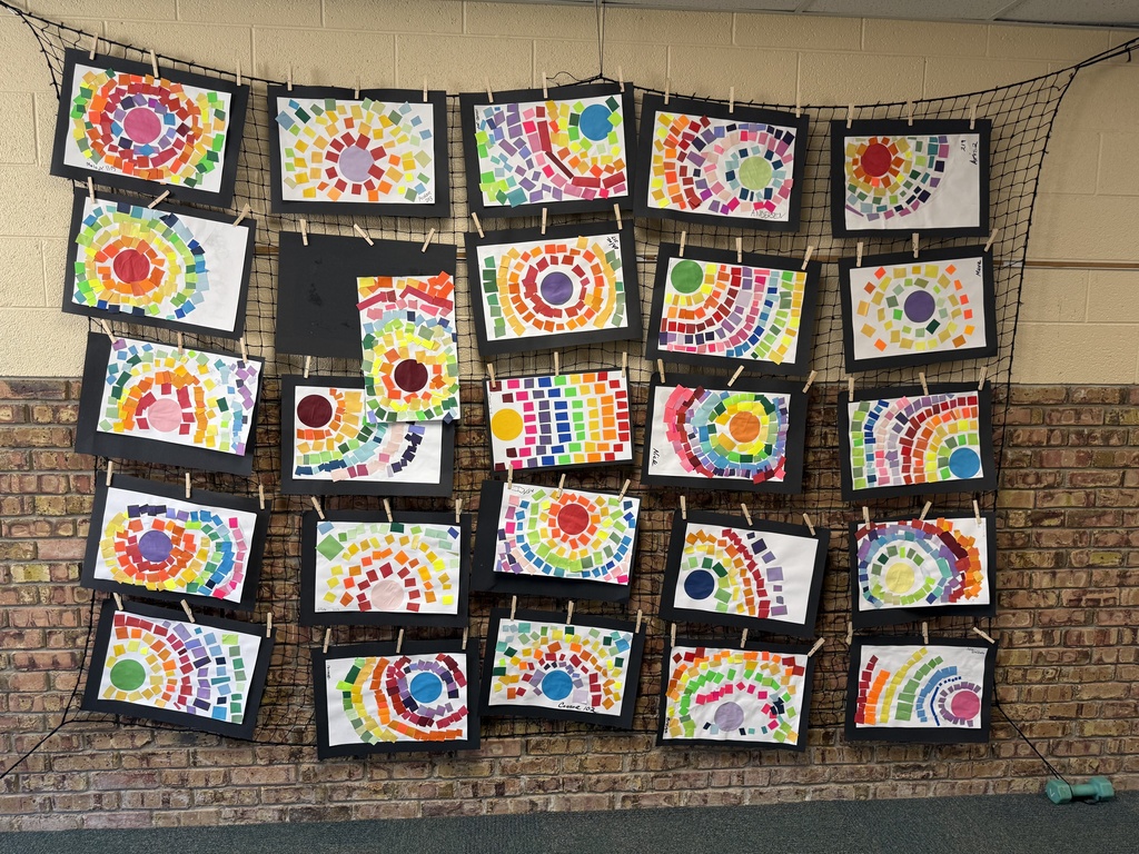 Artwork is displayed in the hallway of Woodland Developmental Center