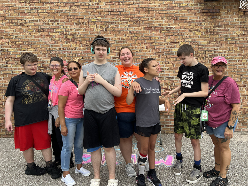 Woodland students and staff pose for the camera during the school's Field Day