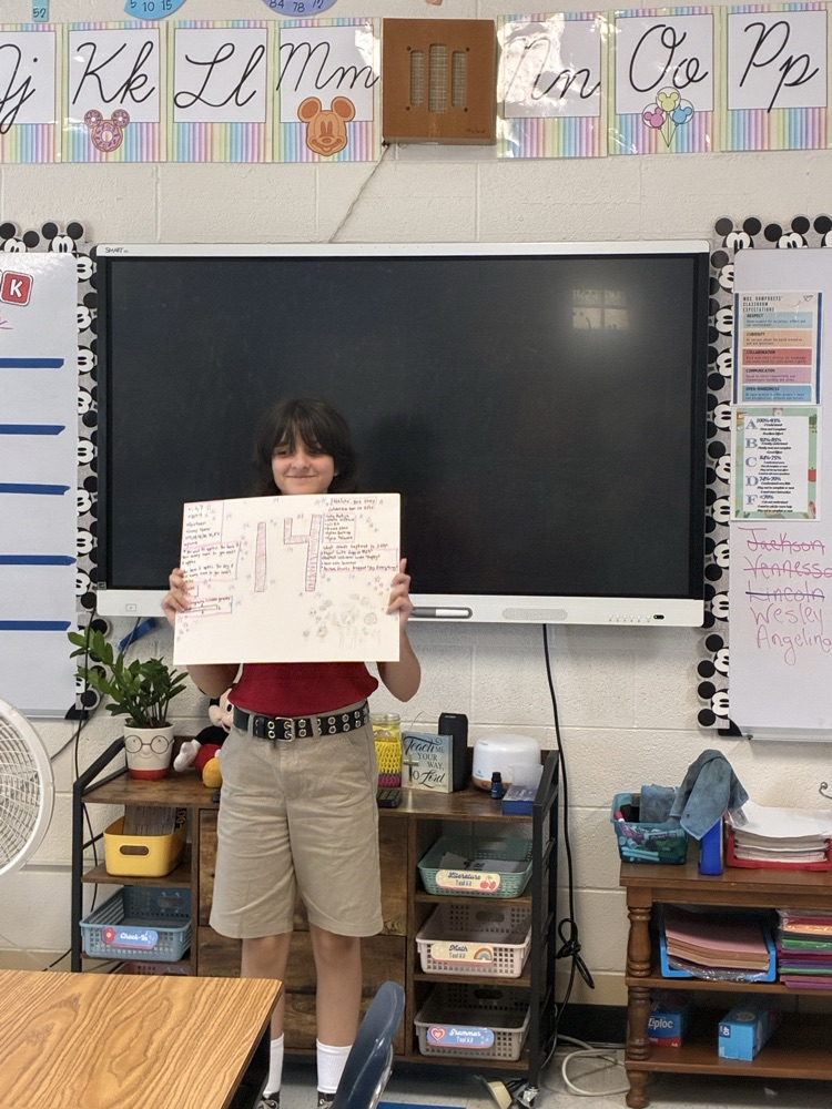 student with poster 