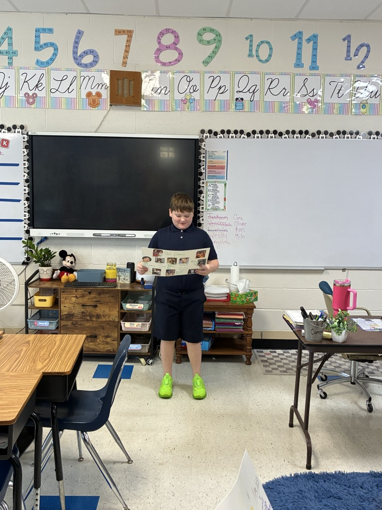 student with poster 