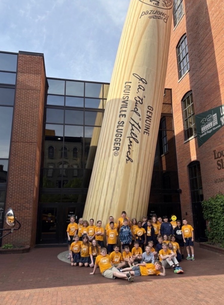 ST EDWARD 4th Grade STUDENTS  AT THE ENTRANCE OF THE SLUGGER MUSEUM