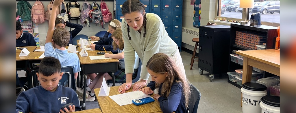 Bellarmine Students at St Edward’s designed and led lessons for our students in grades 2 through 5, helping students during classwork.
