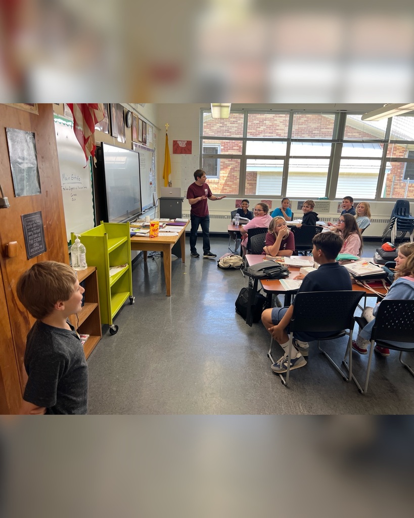 Student visiting a classroom during Principal for a Day.