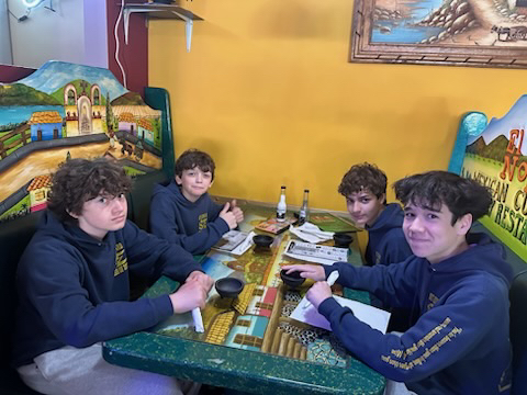Four students sitting together at El Nopal.