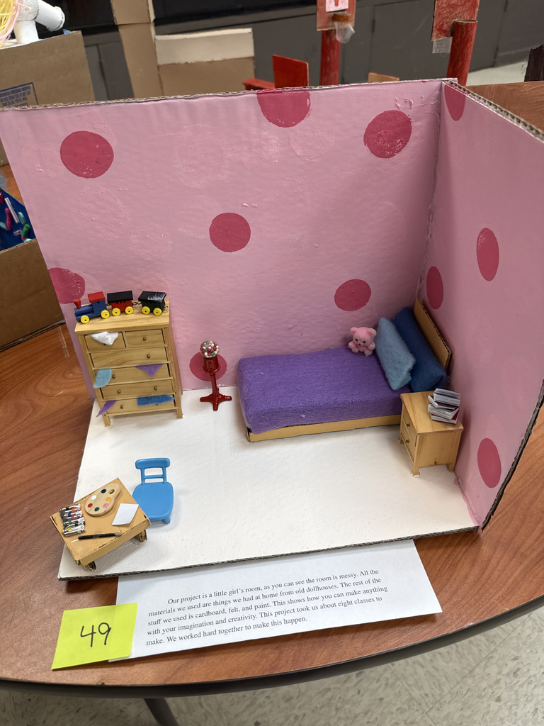 Recycled art project showing a small bedroom scene