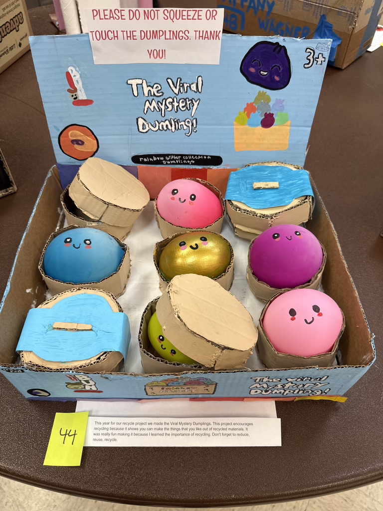 Recycled art project showing colorful mystery dumplings in a box.