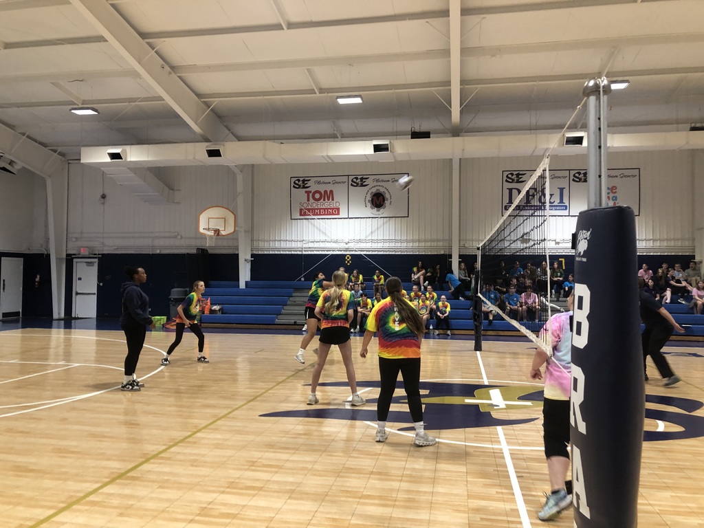 Eighth grade players in tie dye shirts during the match.