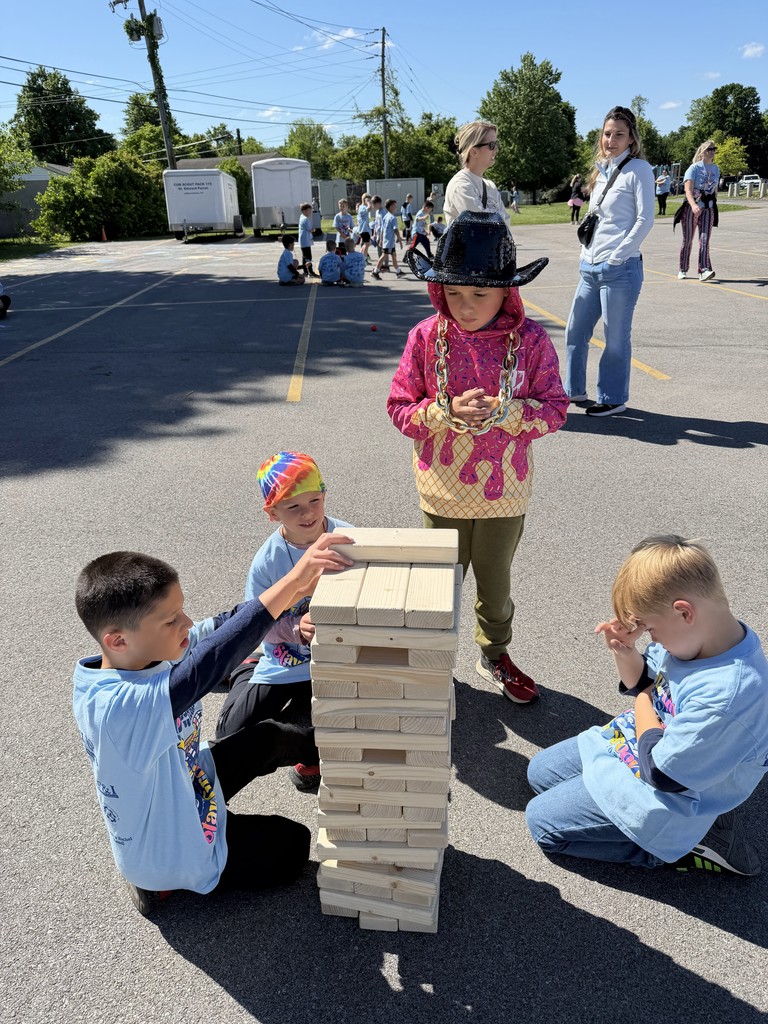 tudents playing giant Jenga during the Walkathon celebration.