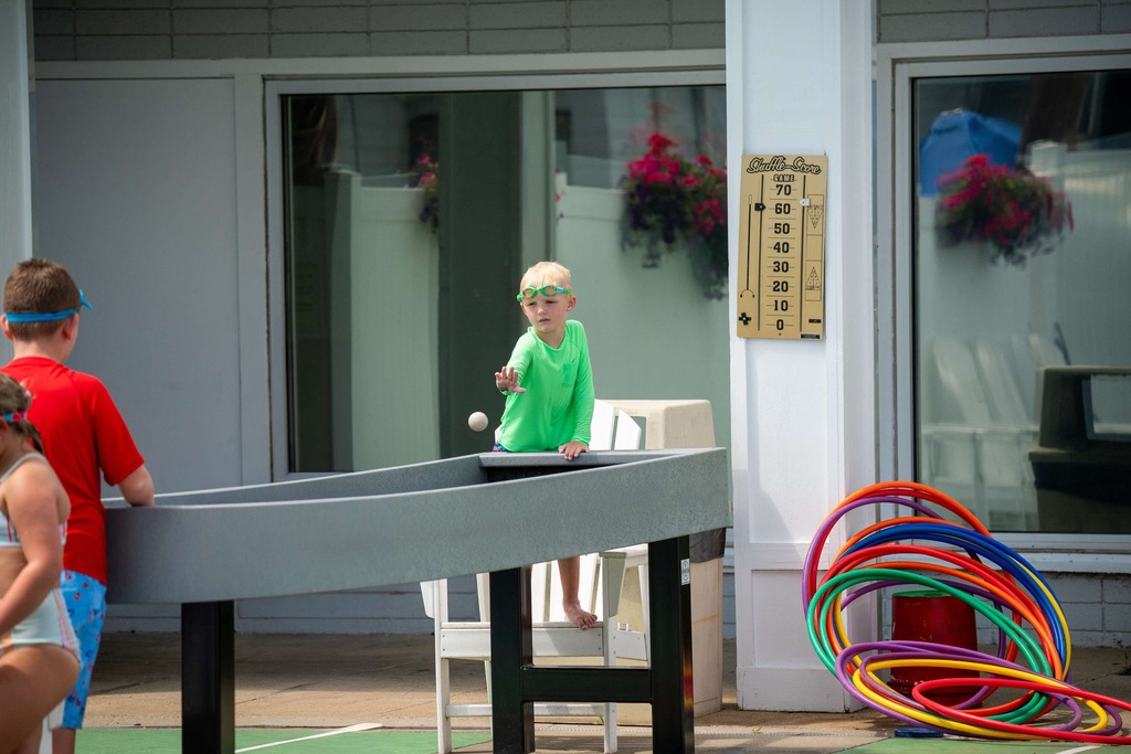 kid playing a table top game