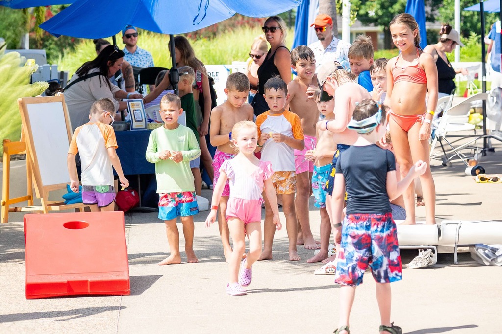kids in their swimming trunks