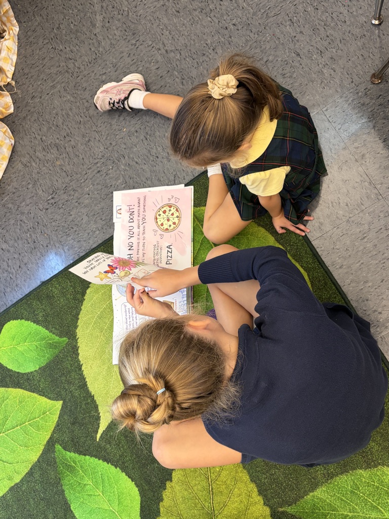 Older students read picture books with preschool students during Brave Buddies, sharing time together in the classroom and building friendships through reading.