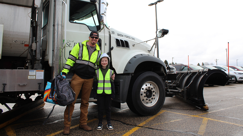 Jack and the driver in front of the snow plow