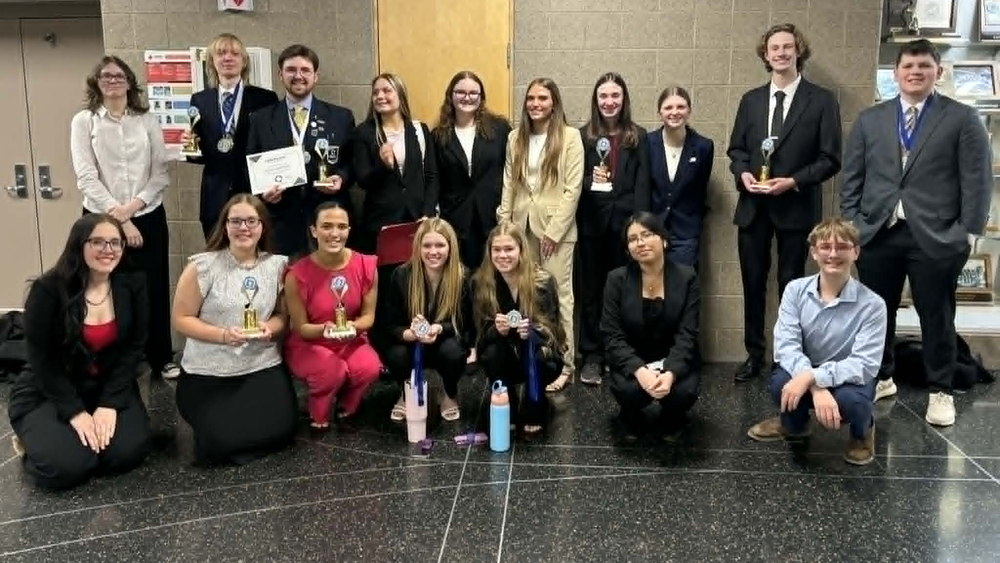 group photo with students holding awards