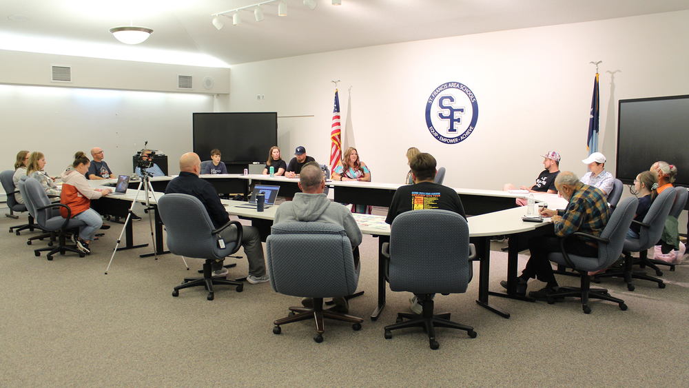 room with people around a table
