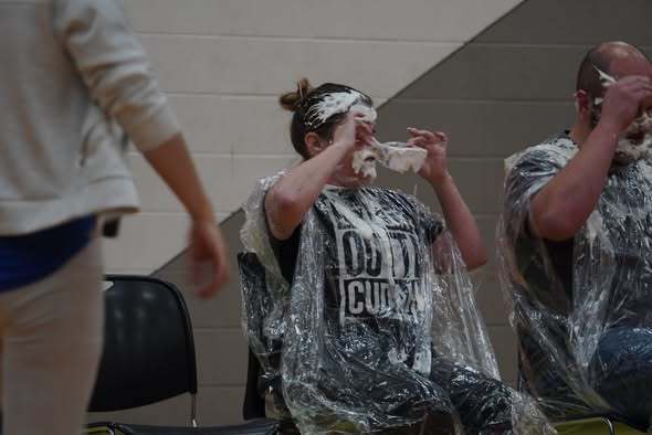 Teacher after being hit by a cream pie at an assembly