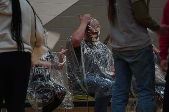 Teacher after being hit by a cream pie at an assembly