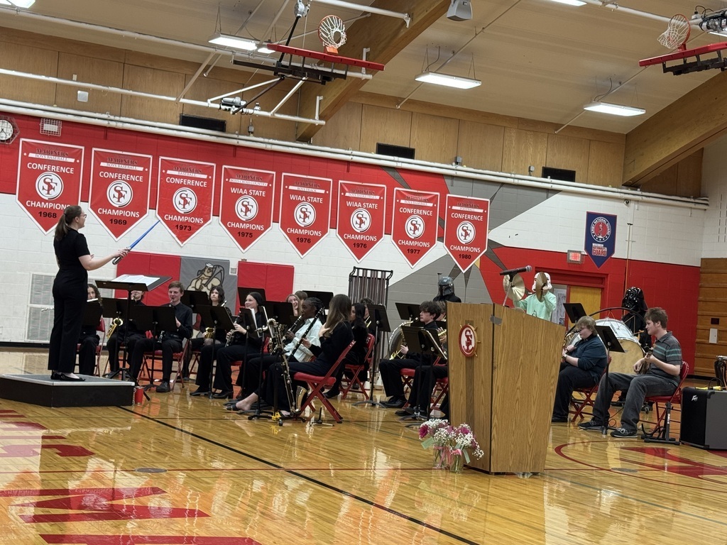 Conductor lead s the band in performance