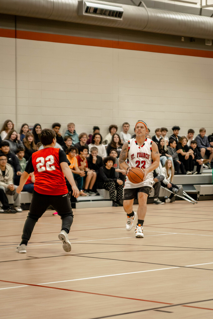 Staff playing against 8th graders. 