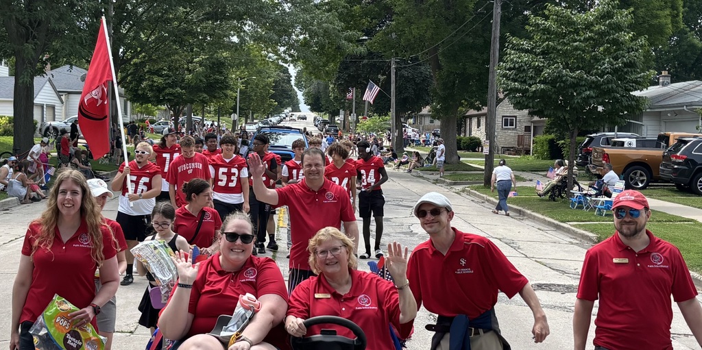 St. Francis parade. Everyone is wearing red.