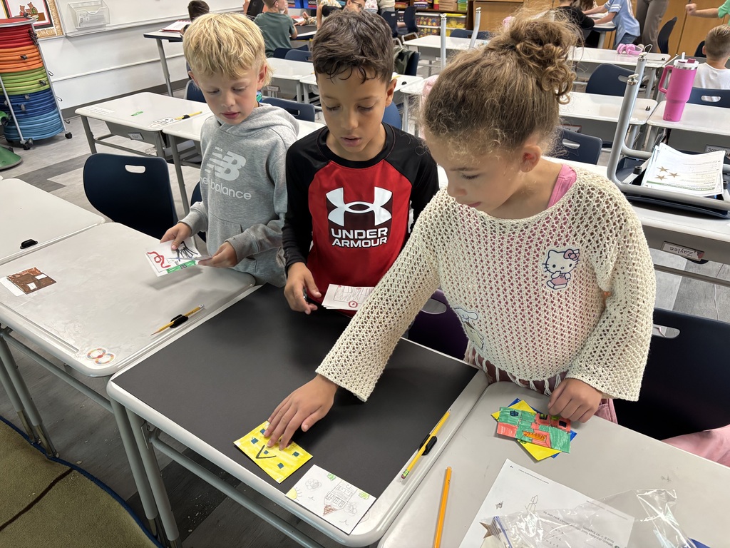Second graders build communities