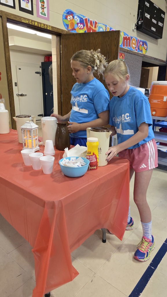 students pouring drinks