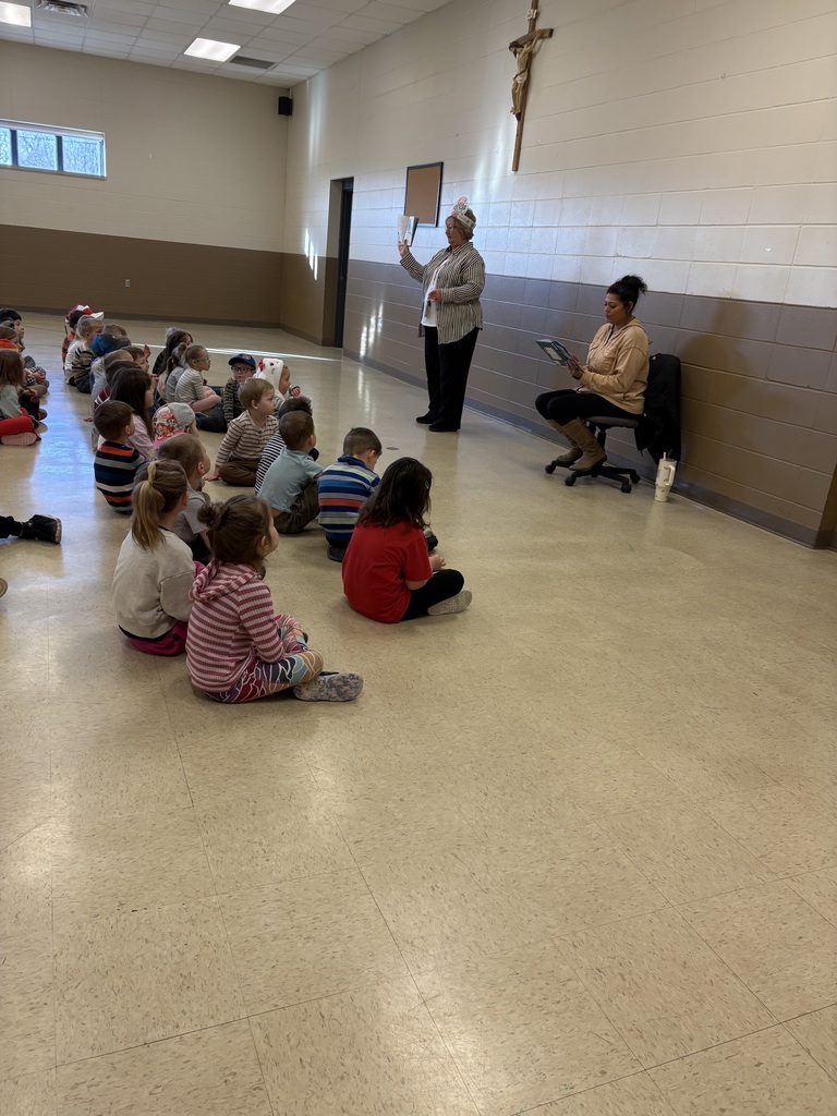 guest reader Jasmine Morgan reads to children