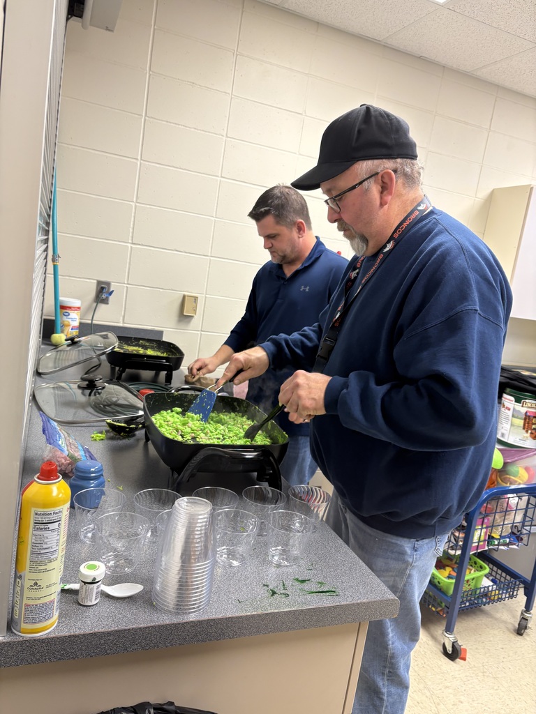 Kyle Wermers and Mr. Dennis cooking green eggs and ham