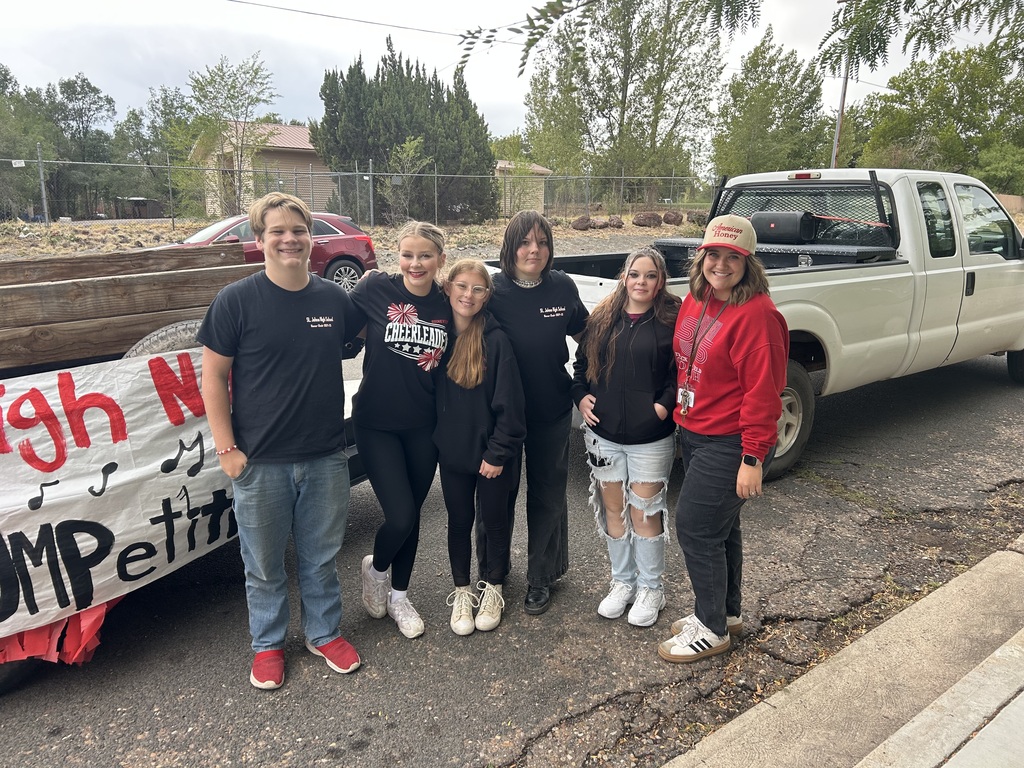 Honor choir in front of their parade float. 