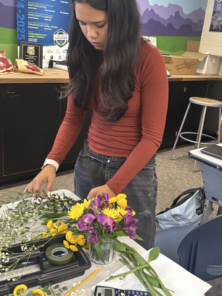 arranging flowers 