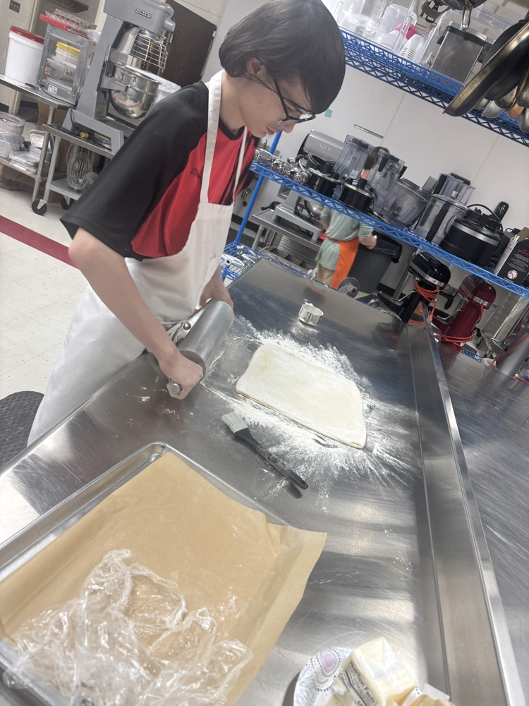 kids rolling croissants