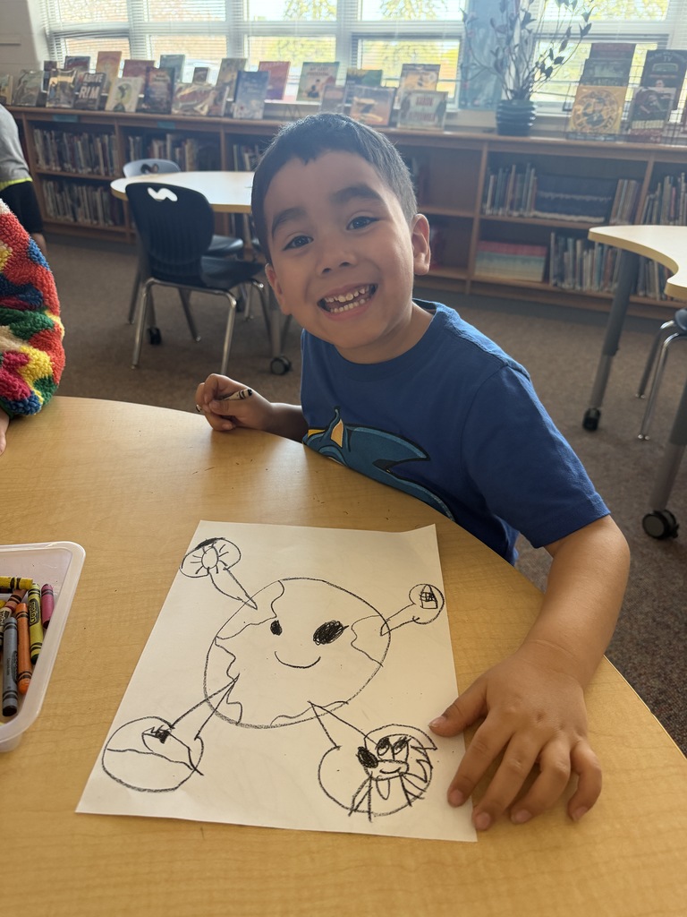 Young 5 student at Brown school is working hard on his Earth Day drawing in stem lab today! 🌏