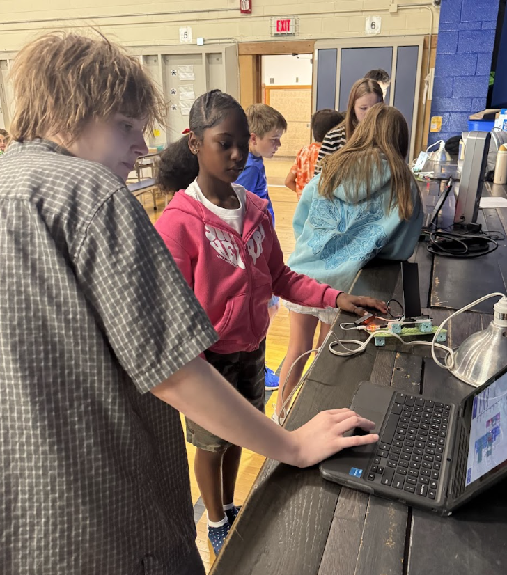 STUDENTS FROM AP ENVIRONMENTAL SCIENCE PARTNER WITH 5TH GRADERS ON A PROJECT SPONSORED BY THE BOSCH CORPORATIION.