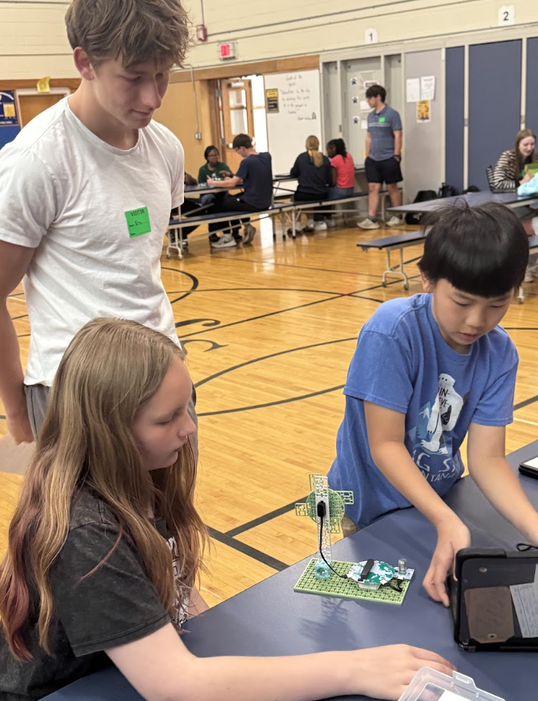 STUDENTS FROM AP ENVIRONMENTAL SCIENCE PARTNER WITH 5TH GRADERS ON A PROJECT SPONSORED BY THE BOSCH CORPORATIION.