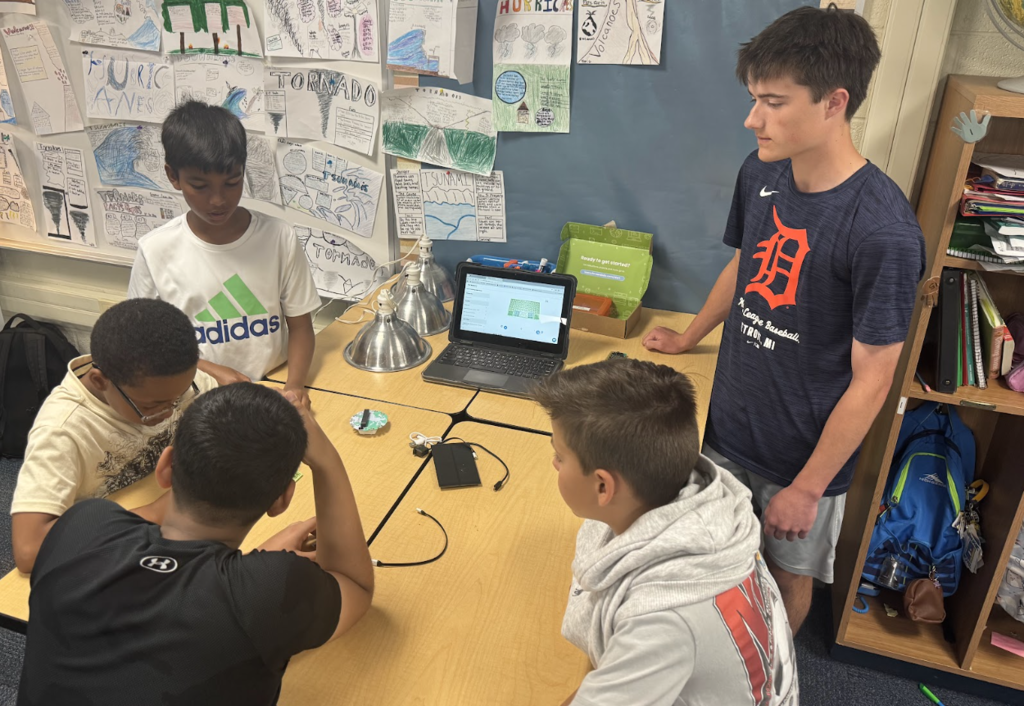 STUDENTS FROM AP ENVIRONMENTAL SCIENCE PARTNER WITH 5TH GRADERS ON A PROJECT SPONSORED BY THE BOSCH CORPORATIION.