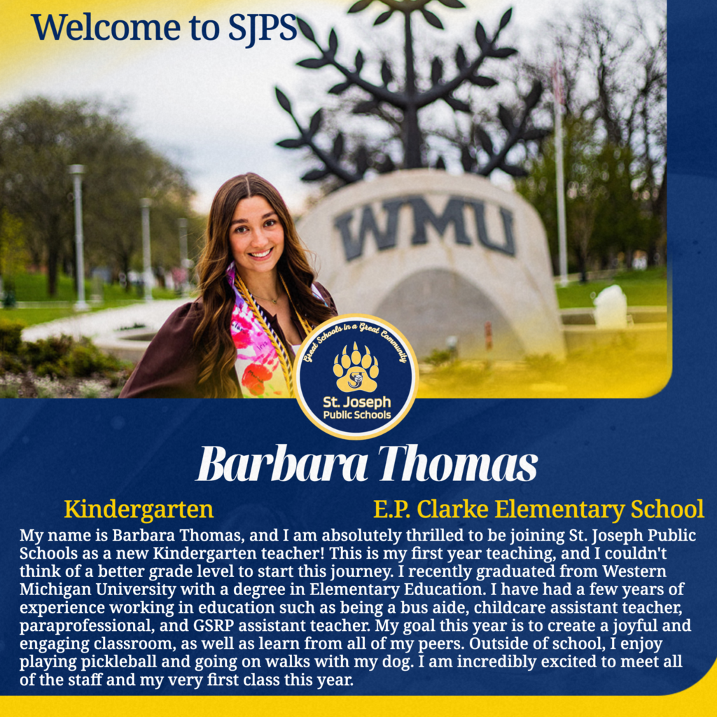 Barbara in her cap and gown in front of a Western Michigan Universrity sign