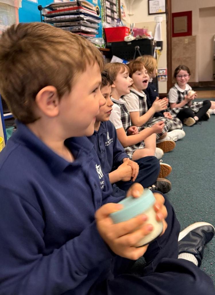 Grade 2makes butter, learns about WNY dairy industry.