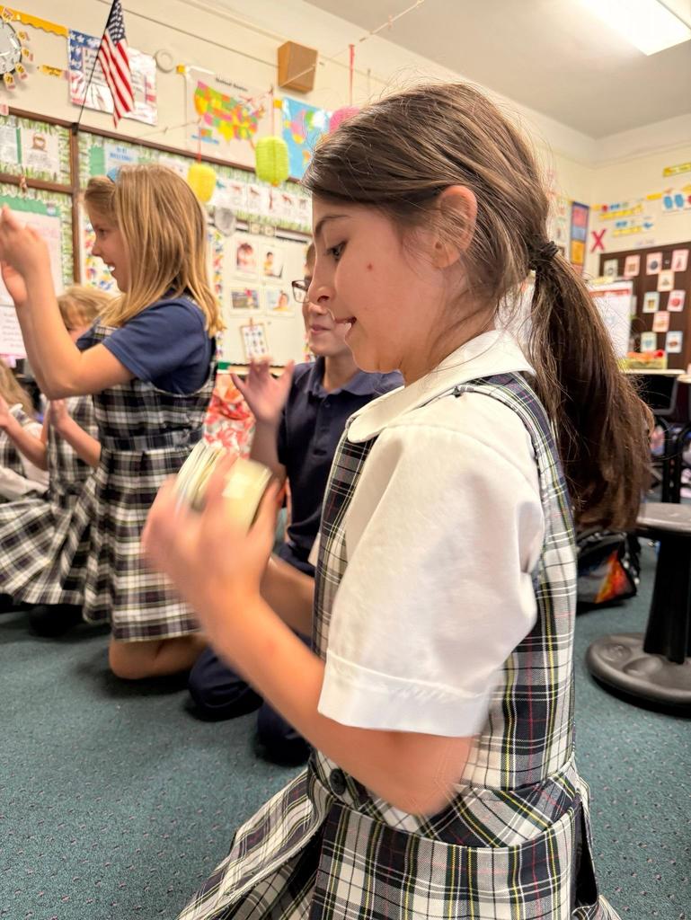 Grade 2makes butter, learns about WNY dairy industry.