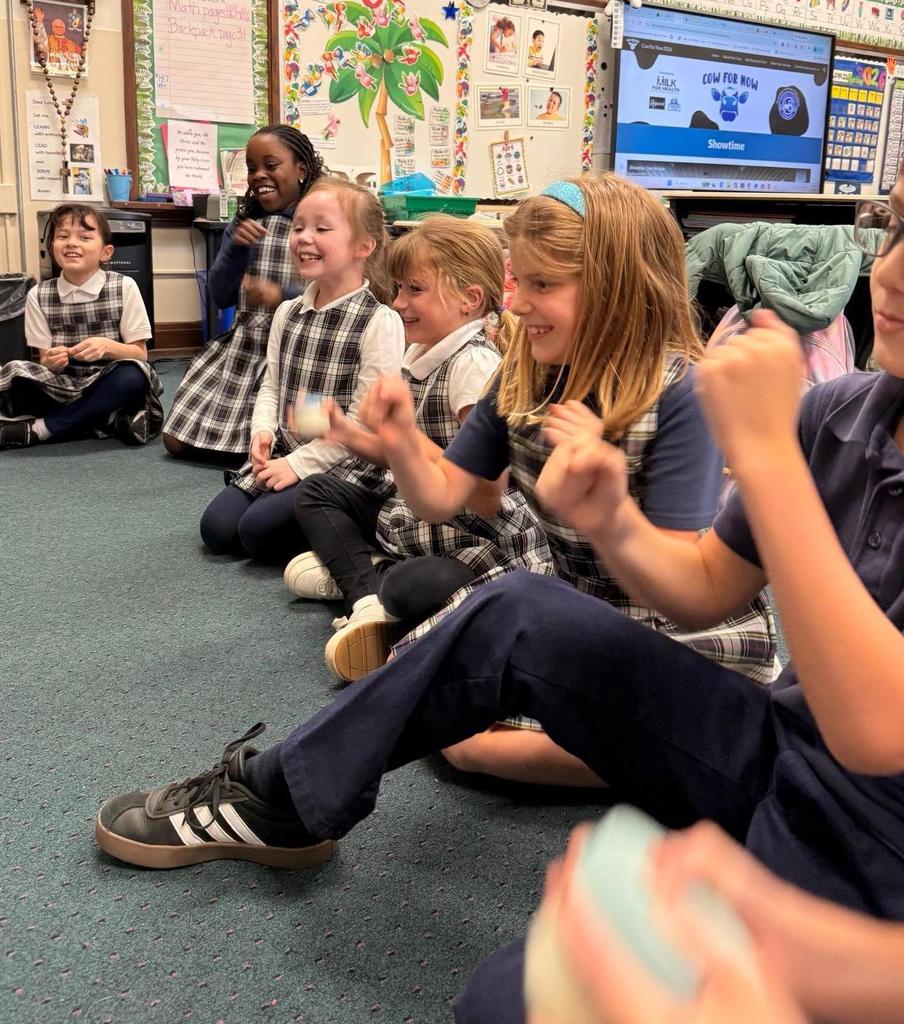 Grade 2makes butter, learns about WNY dairy industry.